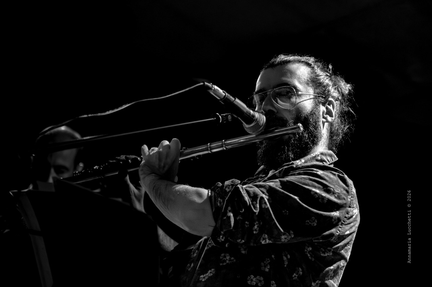 Piero Bittolo Bon playing flute on stage